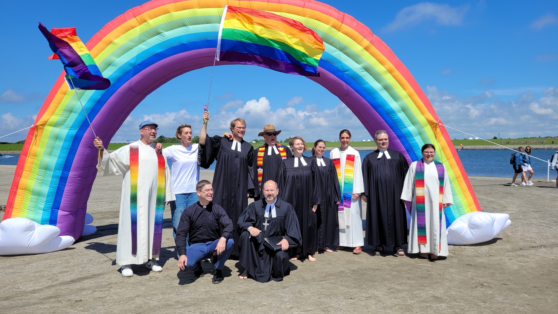 Team unter dem Regenbogen